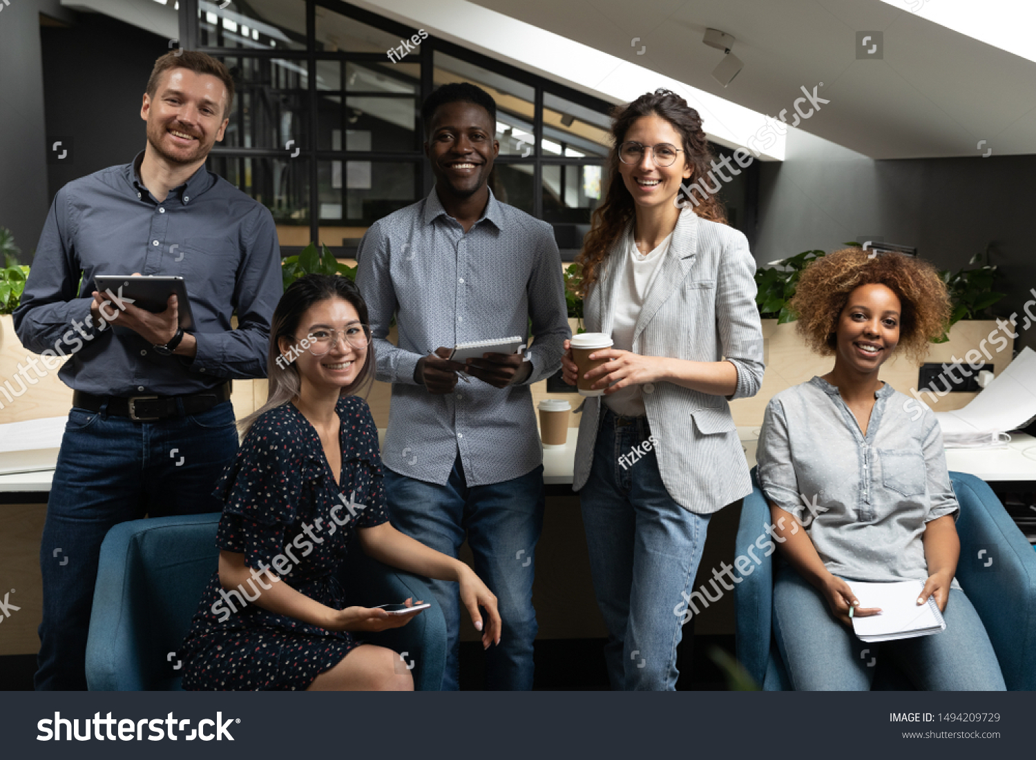 stock-photo-happy-diverse-international-company-staff-business-team-people-colleagues-looking-at-camera-posing-1494209729